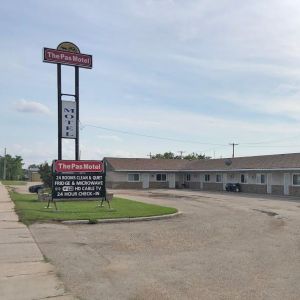 Exterior of the motel and sign
