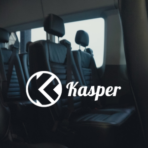 Inside of a 14 passenger van with the Kasper logo