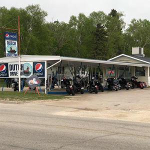 Dutch Drive Inn with motorcycles lined up in stalls