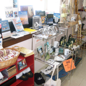 gift shop products ranging from books, bags, t-shirts to Indigenous crafts, mugs and syrups