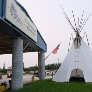 casino sign at front of building and tipi 